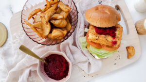 Crispy crumbed haloumi burger with pickled beet & wedges recipe