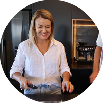 a mum happy cooking in the kitchen with her teenage son